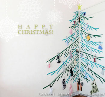 マスキングテープで大きなクリスマスツリーを描いたインテリア空間
